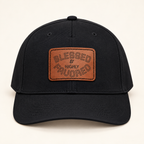 Model mockup of Blessed & Highly Favored Leather Patch Baseball Cap, Black / Light Brown patch / Rectangle colorway