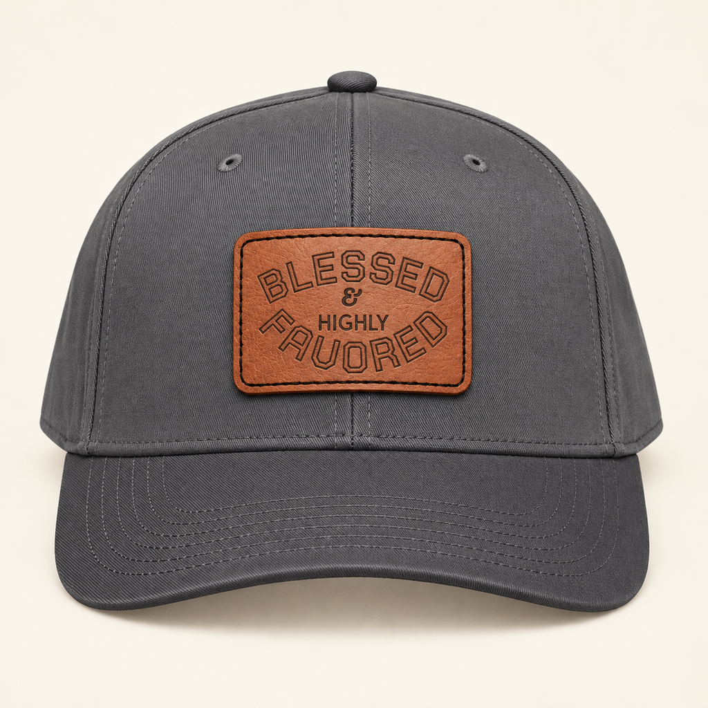 Model mockup of Blessed & Highly Favored Leather Patch Baseball Cap, Charcoal Grey / Light Brown patch / Rectangle colorway