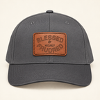 Model mockup of Blessed & Highly Favored Leather Patch Baseball Cap, Charcoal Grey / Light Brown patch / Rectangle colorway