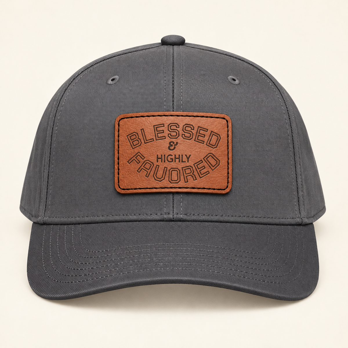 Model mockup of Blessed & Highly Favored Leather Patch Baseball Cap, Charcoal Grey / Light Brown patch / Rectangle colorway