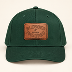 Model mockup of Blessed & Highly Favored Leather Patch Baseball Cap, Dark Green / Light Brown patch / Rectangle colorway