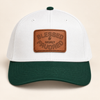 Model mockup of Blessed & Highly Favored Leather Patch Baseball Cap, Dark Green / White / Light Brown patch / Rectangle colorway