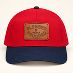 Model mockup of Blessed & Highly Favored Leather Patch Baseball Cap, Red / Navy / Light Brown patch / Rectangle colorway