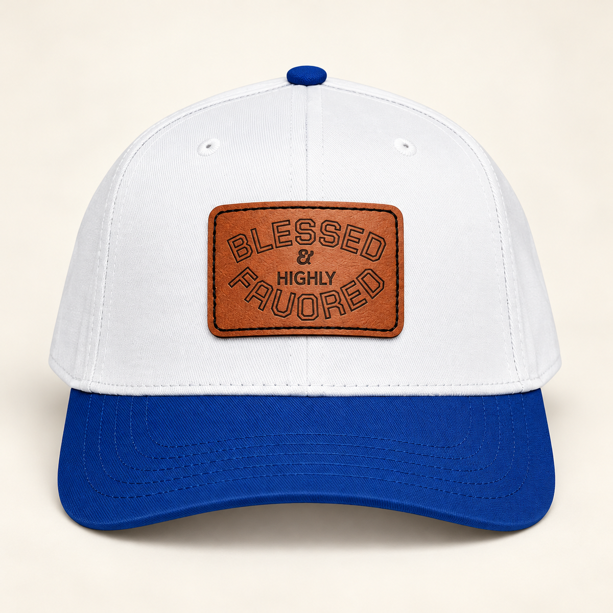 Model mockup of Blessed & Highly Favored Leather Patch Baseball Cap, Royal / White / Light Brown patch / Rectangle colorway