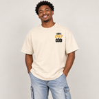 Solo smiling model wearing Child of God tee, Light Apricot