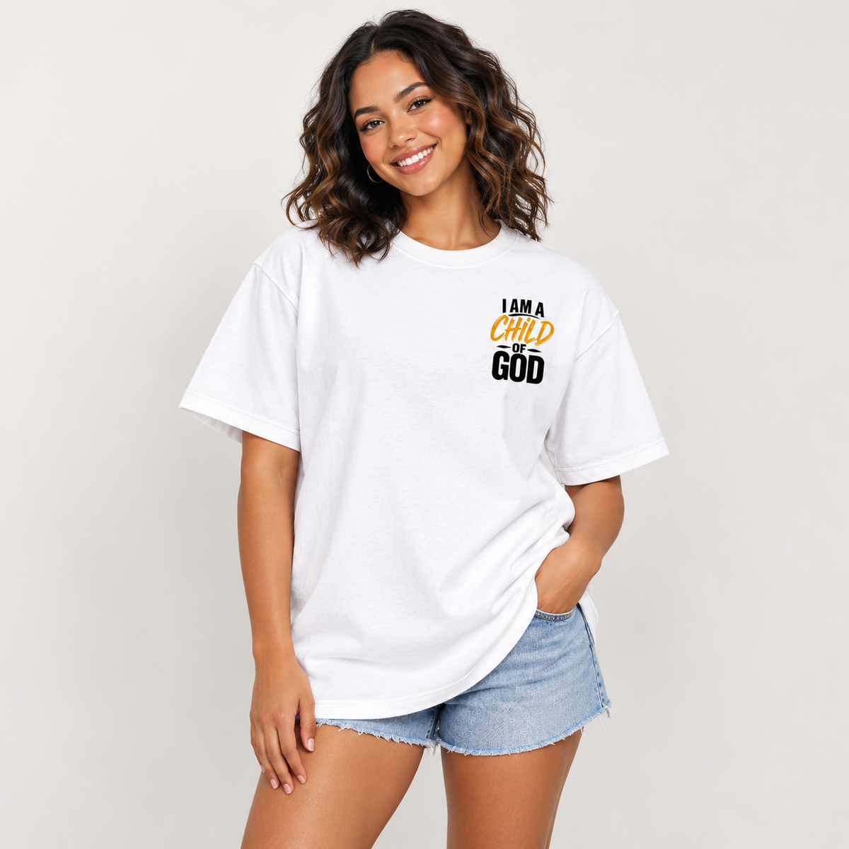 Solo smiling model wearing Child of God tee, Lucent White