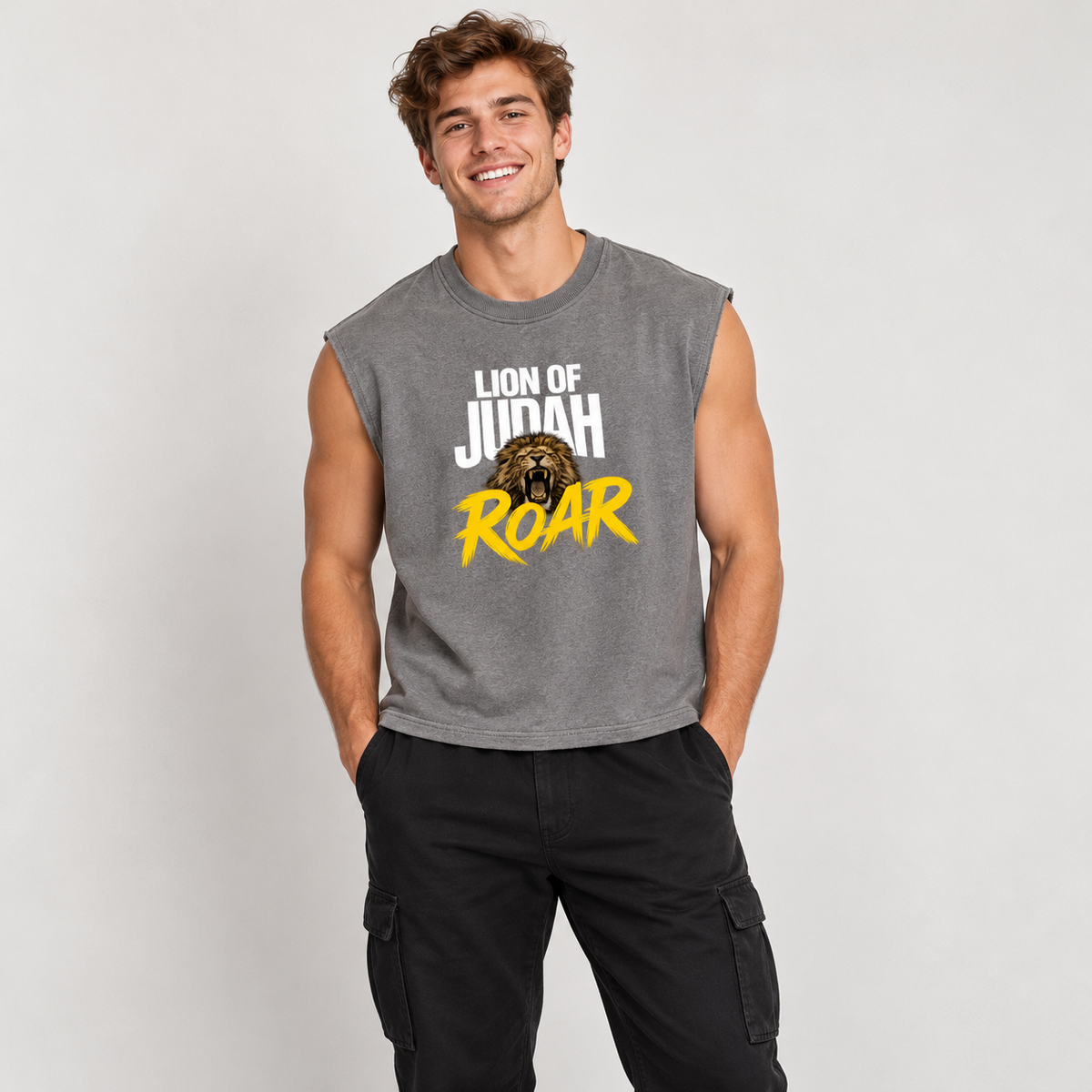 Solo smiling model wearing Lion of Judah - Boxy Tank Top, Gray