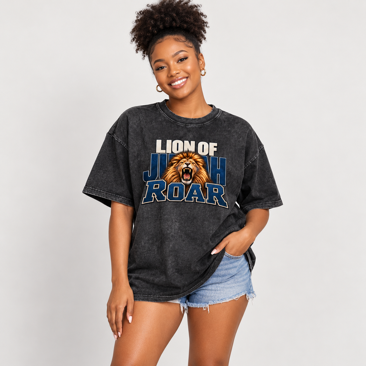 Solo smiling model wearing Lion of Judah Roar - Drop Shoulder Wash T-Shirt, Black