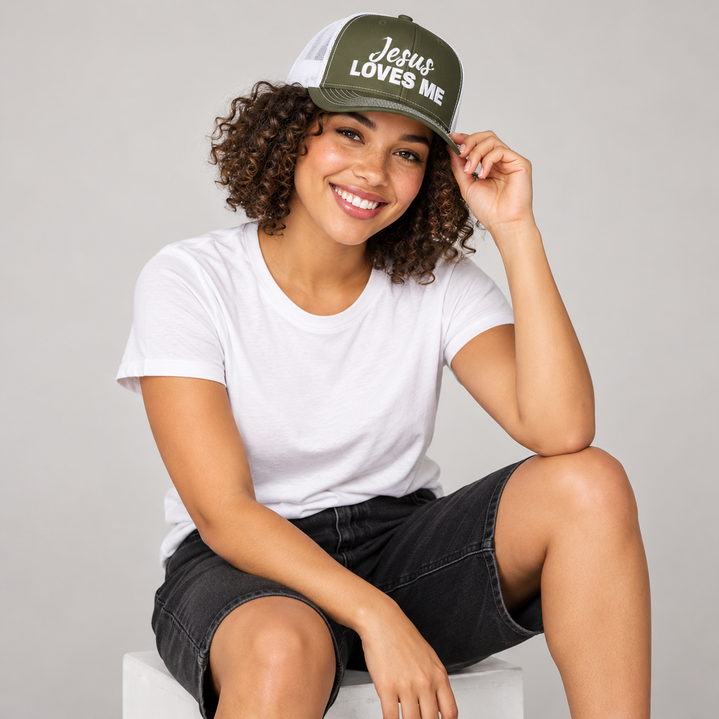 Solo smiling model wearing Jesus Loves Me Christian Snapback Trucker Cap, Loden