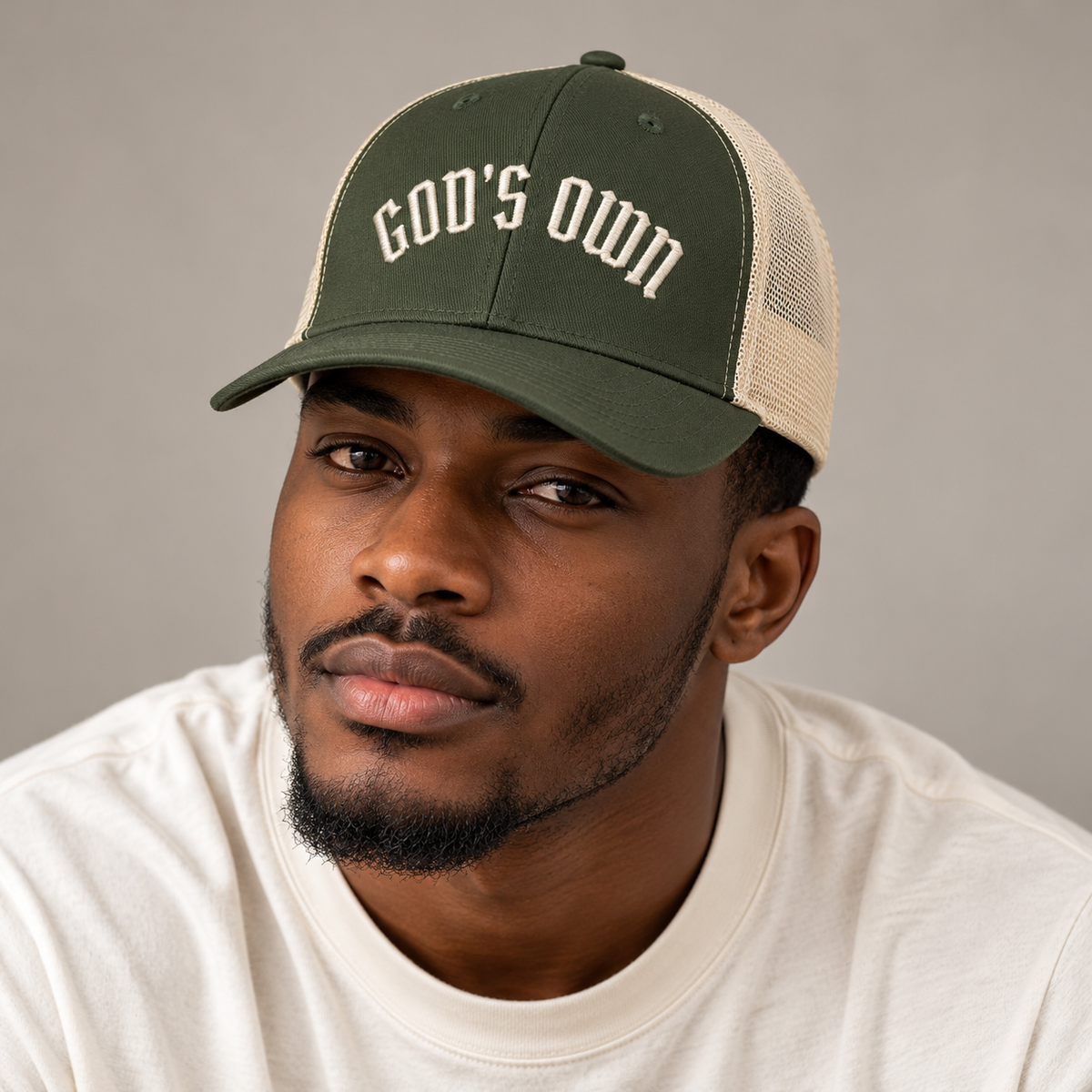 Model mockup of God's Own trucker cap in Moss / Khaki