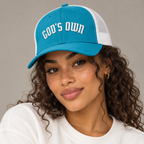 Model mockup of God's Own trucker cap in Turquoise / White