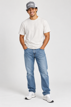 Smiling male model wearing the Heather Grey and White God’s Own trucker cap